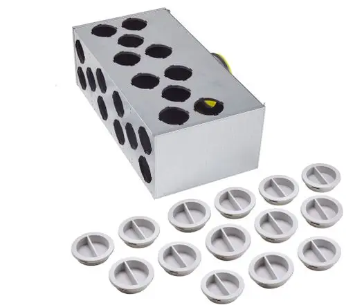 Verteiler mit mehreren Öffnungen für Luftleitungen, aus Metall, mit Zubehörteilen in Form von runden Abdeckungen. Produkt der Marke Fränkische.